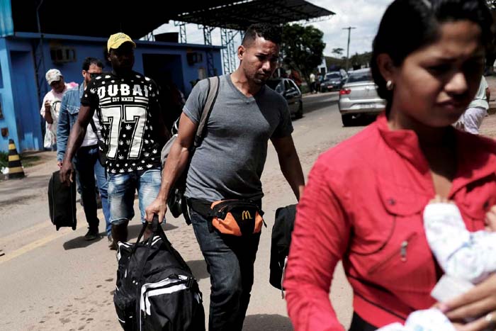 Temer sanciona lei com ações emergenciais para imigrantes