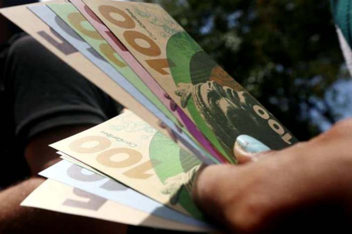 Caracas lança moeda para driblar desvalorização do bolívar