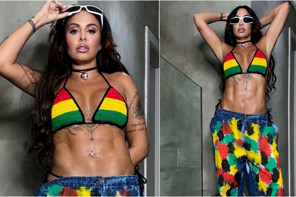 Alinne Rosa exibe barriga trincada em ensaio do Olodum