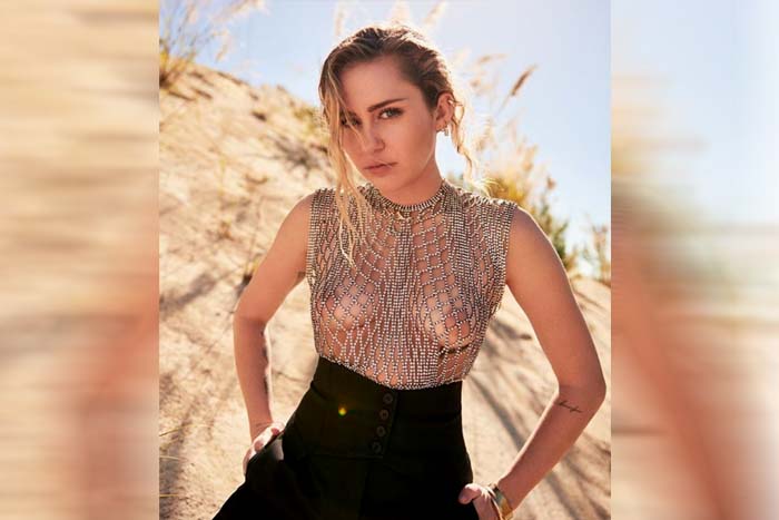 Miley Cyrus posa com seios à mostra e fala de amor sem gêneros