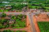 Obras de drenagem, terraplanagem e pavimentação asfáltica são executas no distrito de Vila Marcão